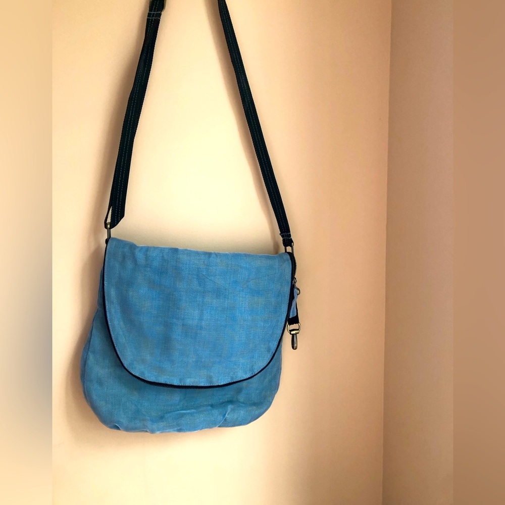 Beautiful hand made cross body bag with multiple zipper pockets